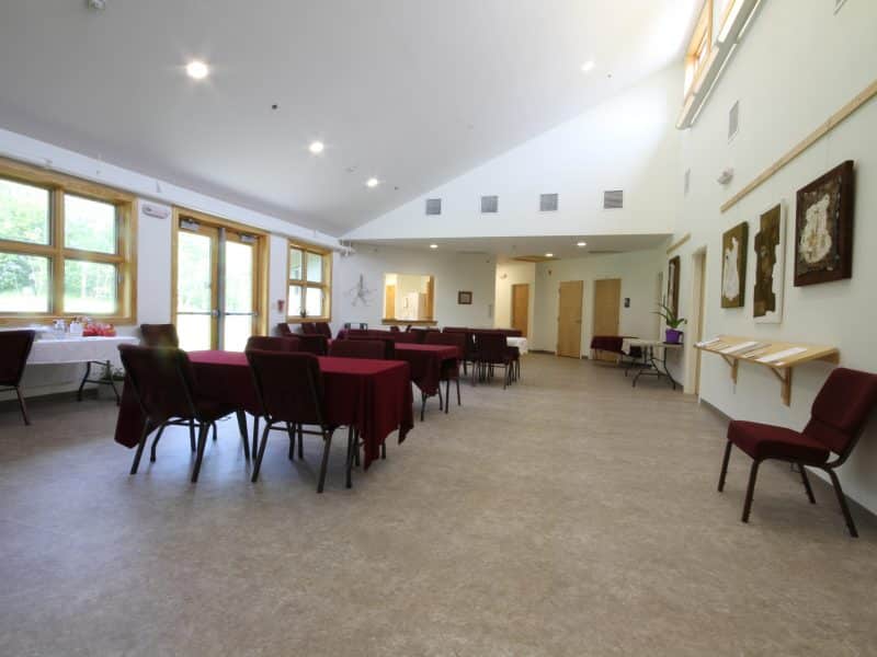 Fellowship hall facing towards religious education rooms and kitchen.