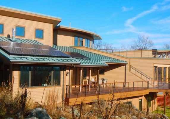 Image of Energy Star Certified, "green" home with solar panels.
